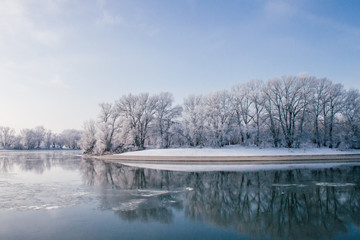 winter landscape with river and trees