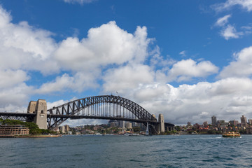Harbor city with downtown skyscraper in business district Sydney with bridge