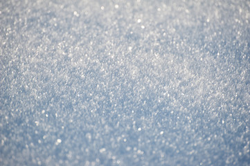 Macro snow background. Winter holidays background with fresh sparkling snow