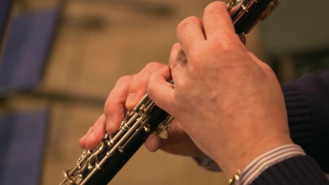 close-up of musician playing on oboe