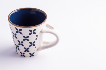 Coffe cup (empty) made of finely decorated blue and white china