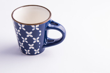 Coffe cup (empty) made of finely decorated blue and white china