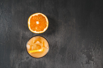 Sex on the beach cocktail in glass on black background. Copy space