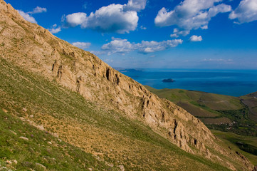 Landscape of the mountain peak.Cloud on foggy lake background.