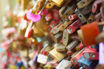 Fototapeta na wymiar Bridge View Cologne where people express their love padlocks hanging on the fences of protection.