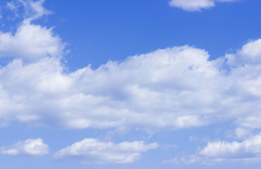 Naklejka na ściany i meble Blue sky white clouds background.