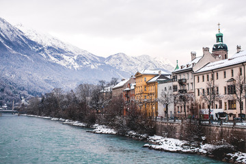 Riverside with mountain view in Innsbruck, Austria in winter time