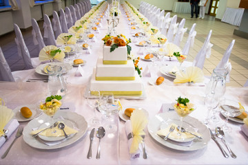 Decorated wedding room with cake