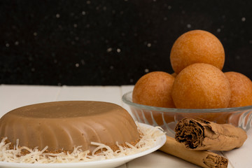 Natilla and buñuelos traditional colombian food.