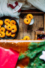 Swedish christmas. Gluten free version Traditional swedish buns in christmas setting. A saffron bun, in Swedish lussebulle or lussekatt. 