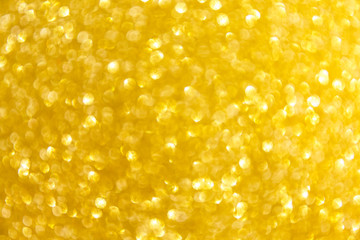 Blurred glitter golden background for holiday and any project