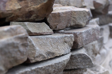 Abstract gray horizontal stone texture. Gray background with cobblestones