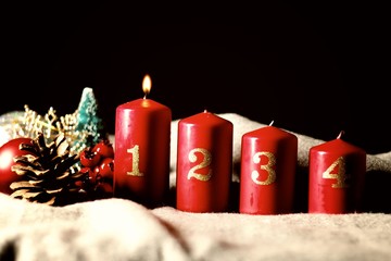 First Sunday (week) of Advent - four Advent candles (with one burning) and Christmas decoration