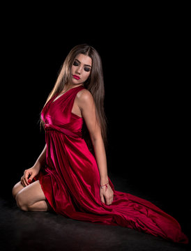 Young woman in a red dress