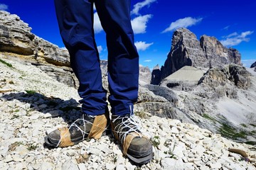 Hikers with repaired hiking boots on the hiking trail 101 at the Bullele-Joch-Hutte, Sexten Dolomites, Alta Pusteria, South Tyrol, Italy, Europe