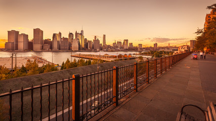 View of Lower Manhattan and East River from Brooklyn Heights at sunset, New York City, USA