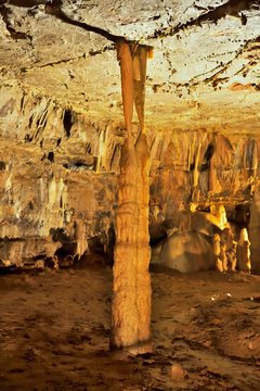 Stalactites and stalagmites have grown together, karst cave, Postojna, Slovenia, Europe