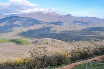 Rocks, bushes and fog in autumn Crimea mountains. Beautiful landscape.