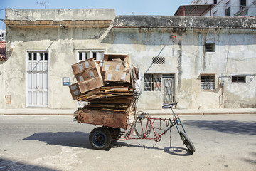 Old rickshaw style bicycle in the street of havana, Cuba
