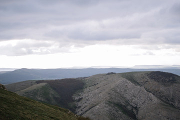 Rocks, bushes and fog in autumn Crimea mountains. Beautiful landscape.