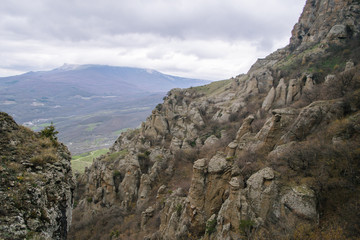 Rocks, bushes and fog in autumn Crimea mountains. Beautiful landscape.