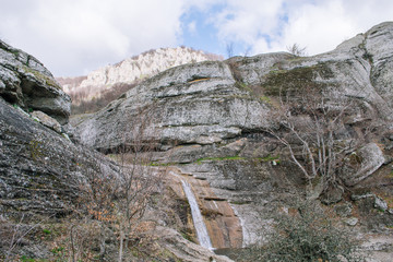Rocks, bushes and fog in autumn Crimea mountains. Beautiful landscape.