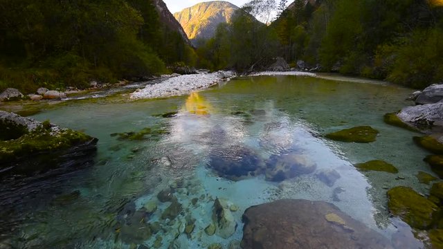 Emerald water in unspoiled Soca river,Slovenia
