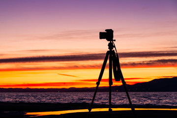Camera on a Tripod and Beautiful Landscape
