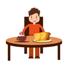 boy eating breakfast in the table