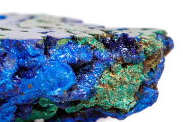 Macro mineral stone malachite with azurite on white background