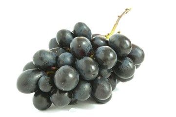 bunch of blue grapes isolated on white