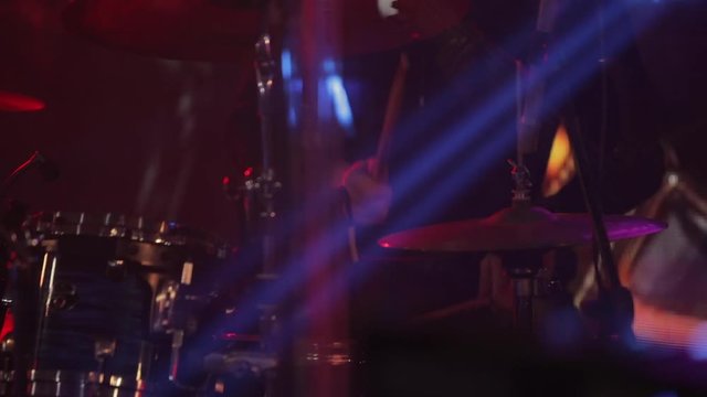 The drummer play in nightclub, video in slow motion