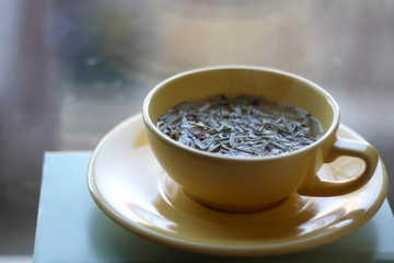 Tea mix in a yellow cup. Selective focus. 
