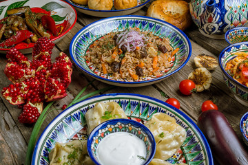 dishes of Uzbek cuisine lagman, pilaf, manti