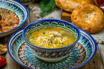 Chicken soup bouillon in a plate
