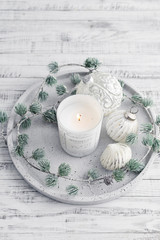 Tray with christmas decorations and candle