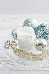 Tray with christmas decorations and candle