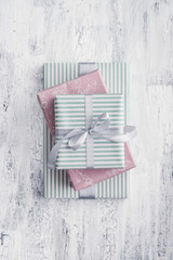 Stack gift boxes with gray ribbon