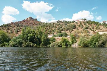 Fototapeta na wymiar castle on river shore