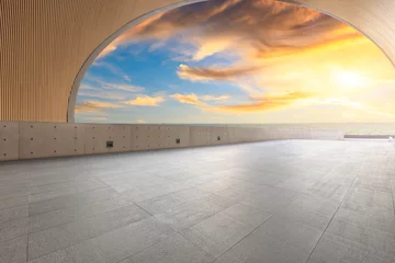  Empty floor and dramatic sky with coastline at sunset © ABCDstock