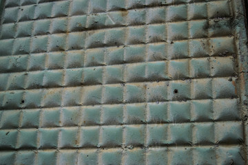 Background concrete wall, traces of weathering, worn wall damaged paint old paint. Remains of old paint on the painted concrete surface. Grungy destruction surface.
