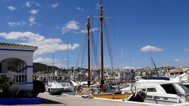 Spanish Marina in Puerto de La Duquesa in The Costa del Sol in Spain.
Camera = Static shot of an old sailing yacht.