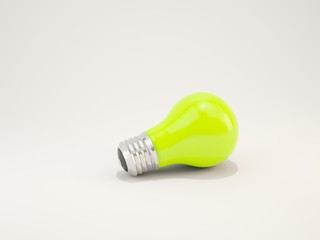 Green light bulb isolated on white background