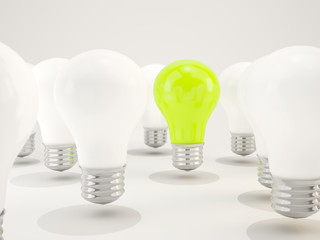 Green light bulb with white bulbs