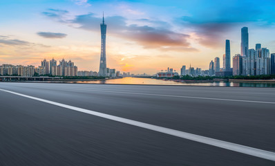 City skyscrapers and road asphalt pavement