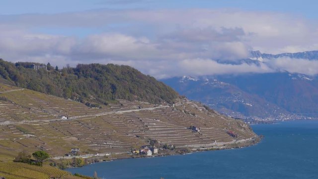 Lavaux vineyard on a cold autumn windy day. Train passing along the shore of Lake L&radic;&copy;man. Snow covered alpine summits in the background
Lavaux - Switzerland