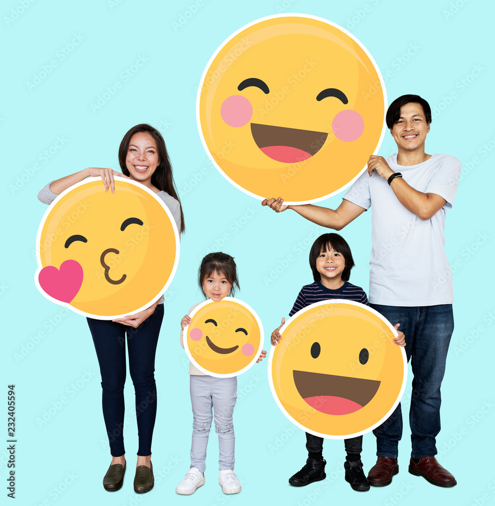 Wall mural happy family holding emoji icons