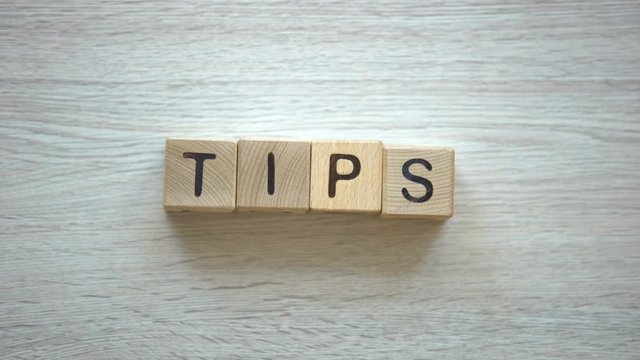 Tips word made by female hands, useful advices and helpful video lessons, vlog
