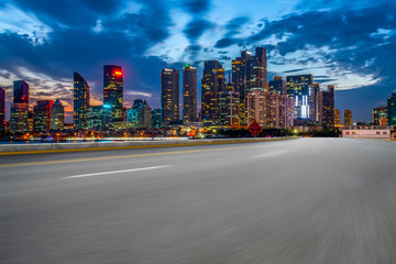 City skyscrapers and road asphalt pavement