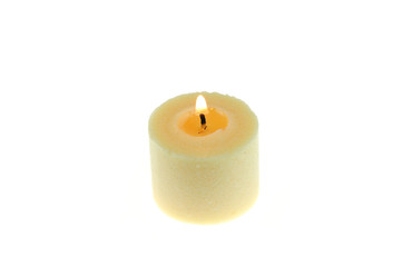 Obraz na płótnie Canvas candle flame fire of white candle on white background